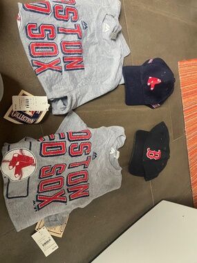 MLB Boston Red Sox swag. Two T-shirts and two adjustable hats.